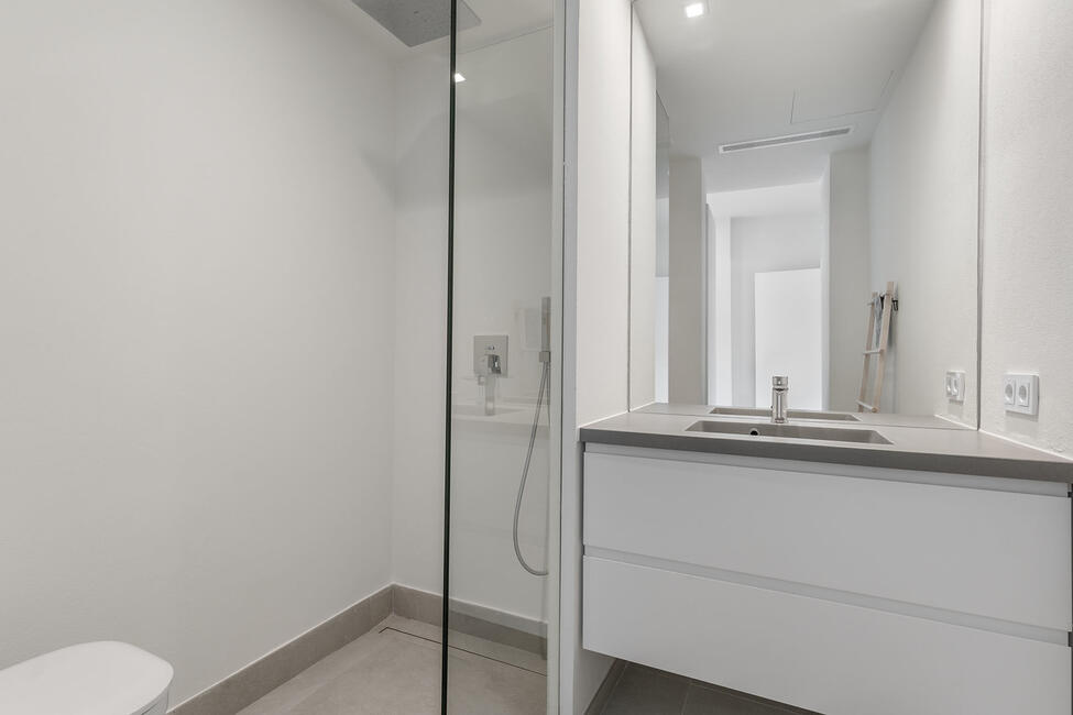 Luxuriously renovated garden apartment with communal pool in Portals Nous