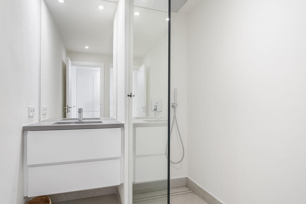 Luxuriously renovated garden apartment with communal pool in Portals Nous
