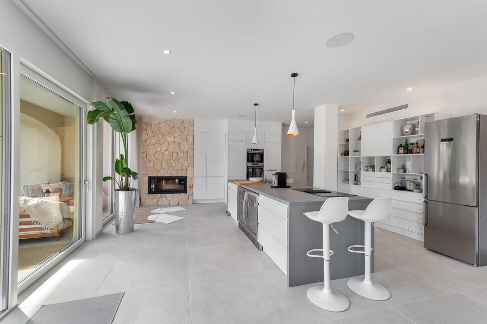 Luxuriously renovated garden apartment with communal pool in Portals Nous
