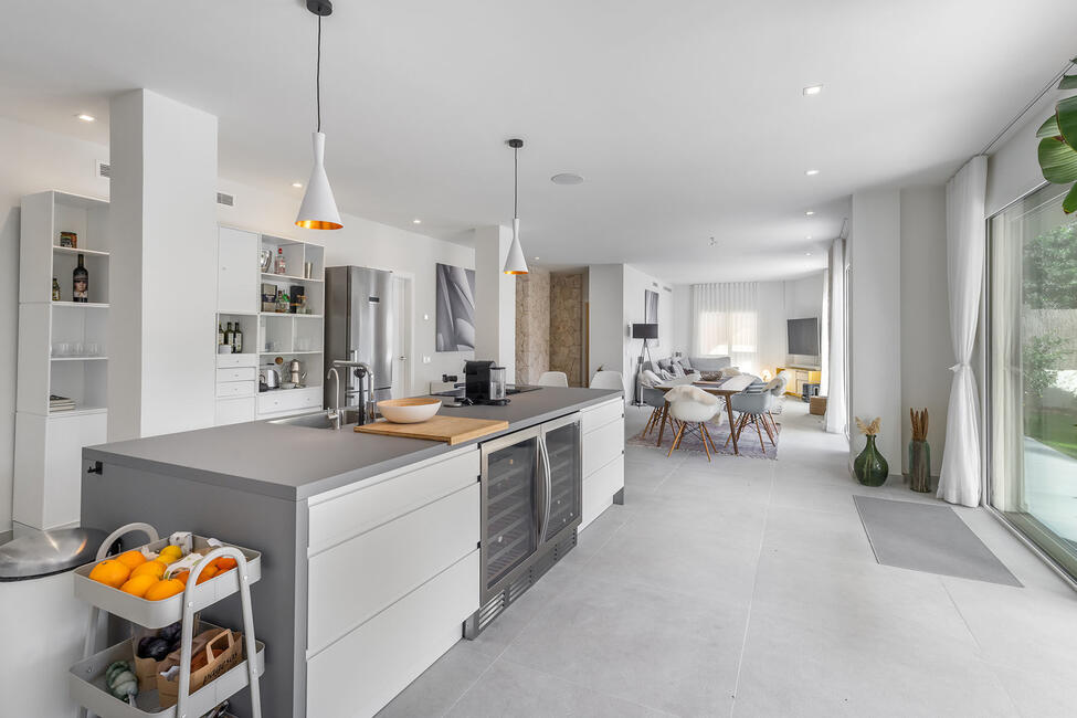 Luxuriously renovated garden apartment with communal pool in Portals Nous