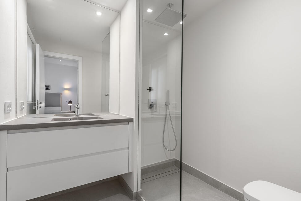 Luxuriously renovated garden apartment with communal pool in Portals Nous