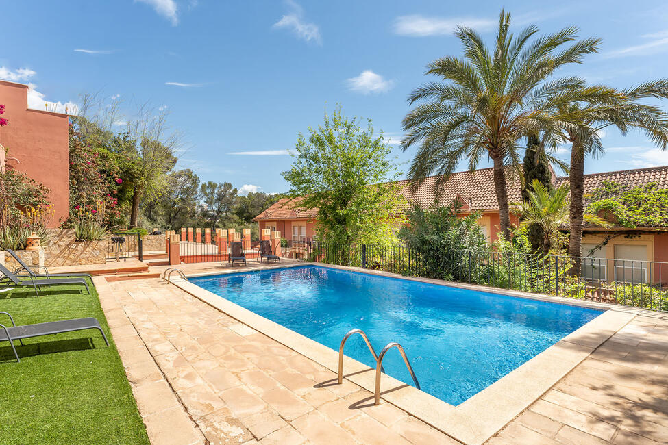 Modern townhouse with sea views and communal pool in Cas Catala