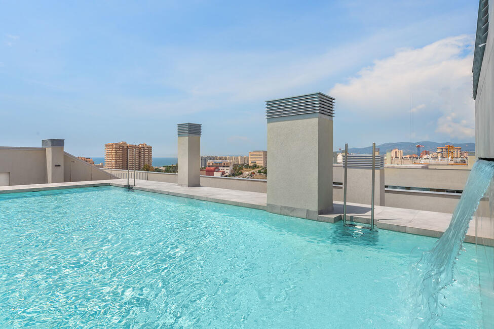 New construction penthouse with partial sea view and community pool in Portixol