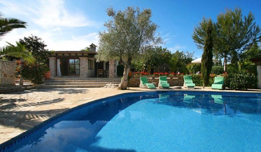 Pollenca property for sale - Modern house with panoramic windows. Bright architecture with views to the garden.